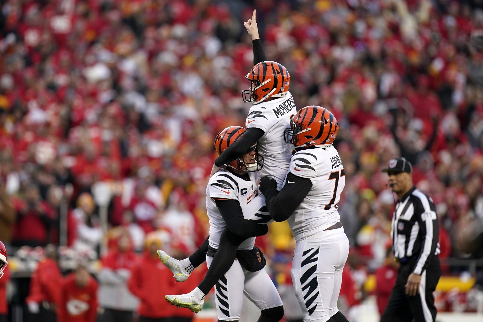 Cincinnati Bengals kicker Evan McPherson (2) celebrates with teammates after kicking a 31-yard field goal during overtime in the AFC championship NFL football game against the Kansas City Chiefs, Sund ...