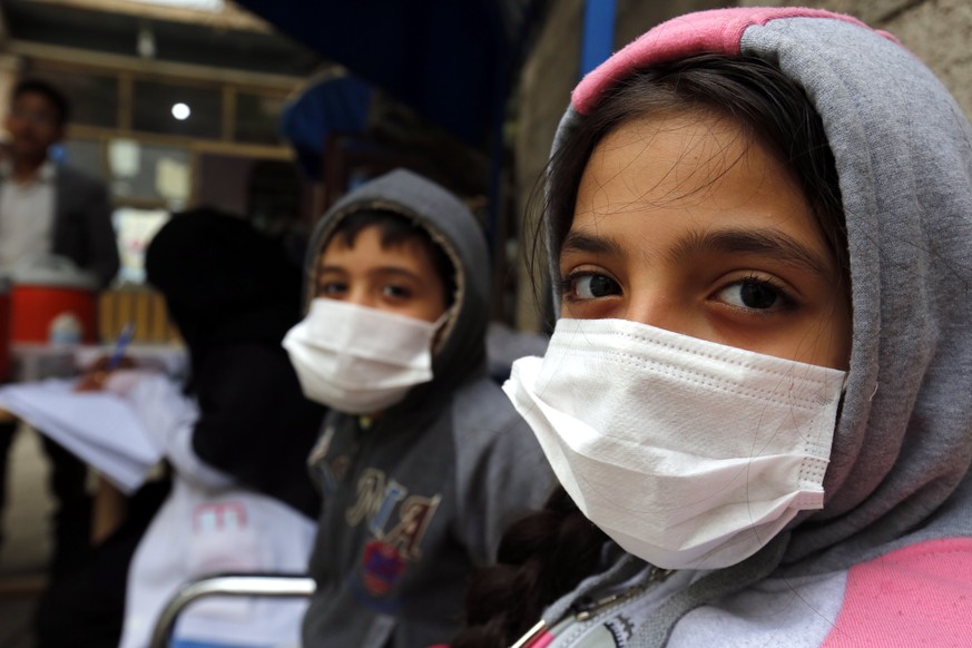 epa06610613 Yemeni children wait to receive anti-diphtheria vaccines during a vaccination campaign amid an acute diphtheria outbreak at a health center in Sana&#039;a, Yemen, 17 March 2018. According  ...