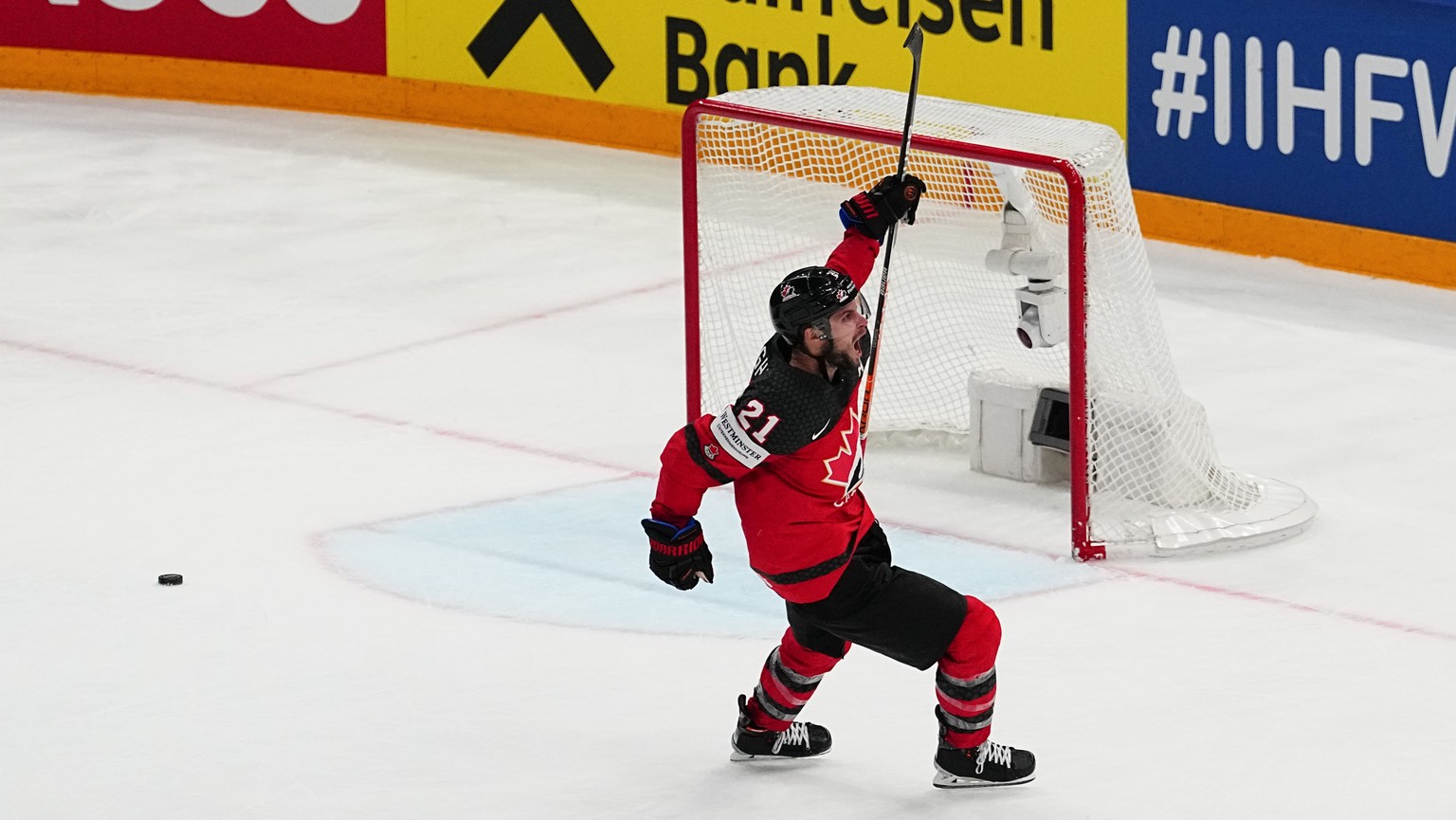 Canada&#039;s Scott Laughton (21) celebrates his empty net goal during the gold medal match against Germany at the Ice Hockey World Championship in Tampere, Finland, Sunday, May 28, 2023. Canada won 5 ...