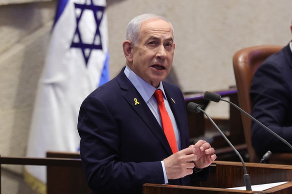 epa12629202 Israeli Prime Minister Benjamin Netanyahu speaks during a debate initiated by the opposition as part of a plenary session in the Knesset, the Israeli parliament, in Jerusalem, 05 January 2 ...