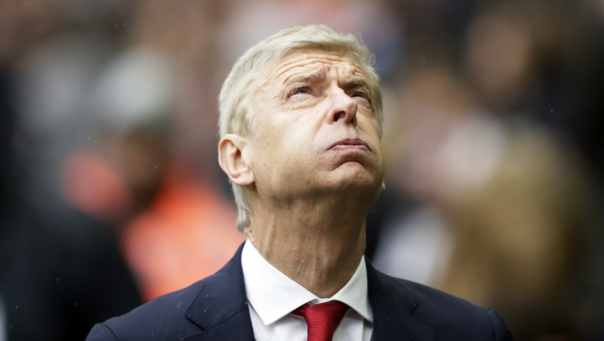 FILE - In this Saturday, Feb. 10, 2018 file photo, Arsenal&#039;s manager Arsene Wenger looks on before their English Premier League soccer match against Tottenham Hotspur at Wembley Stadium, London.  ...