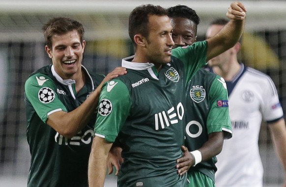 Sporting&#039;s Jefferson Nascimento celebrates after scoring his side&#039;s 2nd goal during a Champions League Group G soccer match between Sporting and Schalke 04 at Sporting&#039;s Alvalade stadiu ...