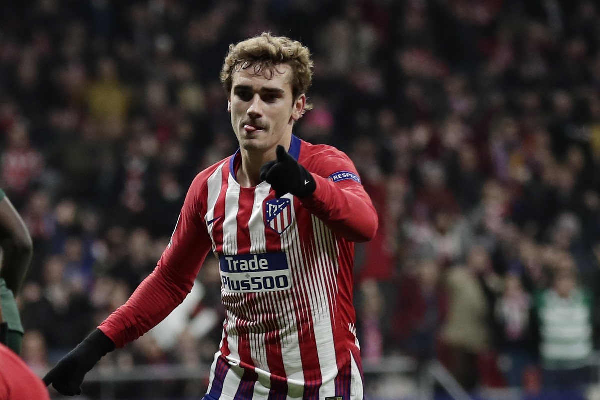 FILE - In this Wednesday, Nov. 28, 2018 file photo, Atletico forward Antoine Griezmann after scoring his side's second goal during a Group A Champions League soccer match between Atletico Madrid  ...