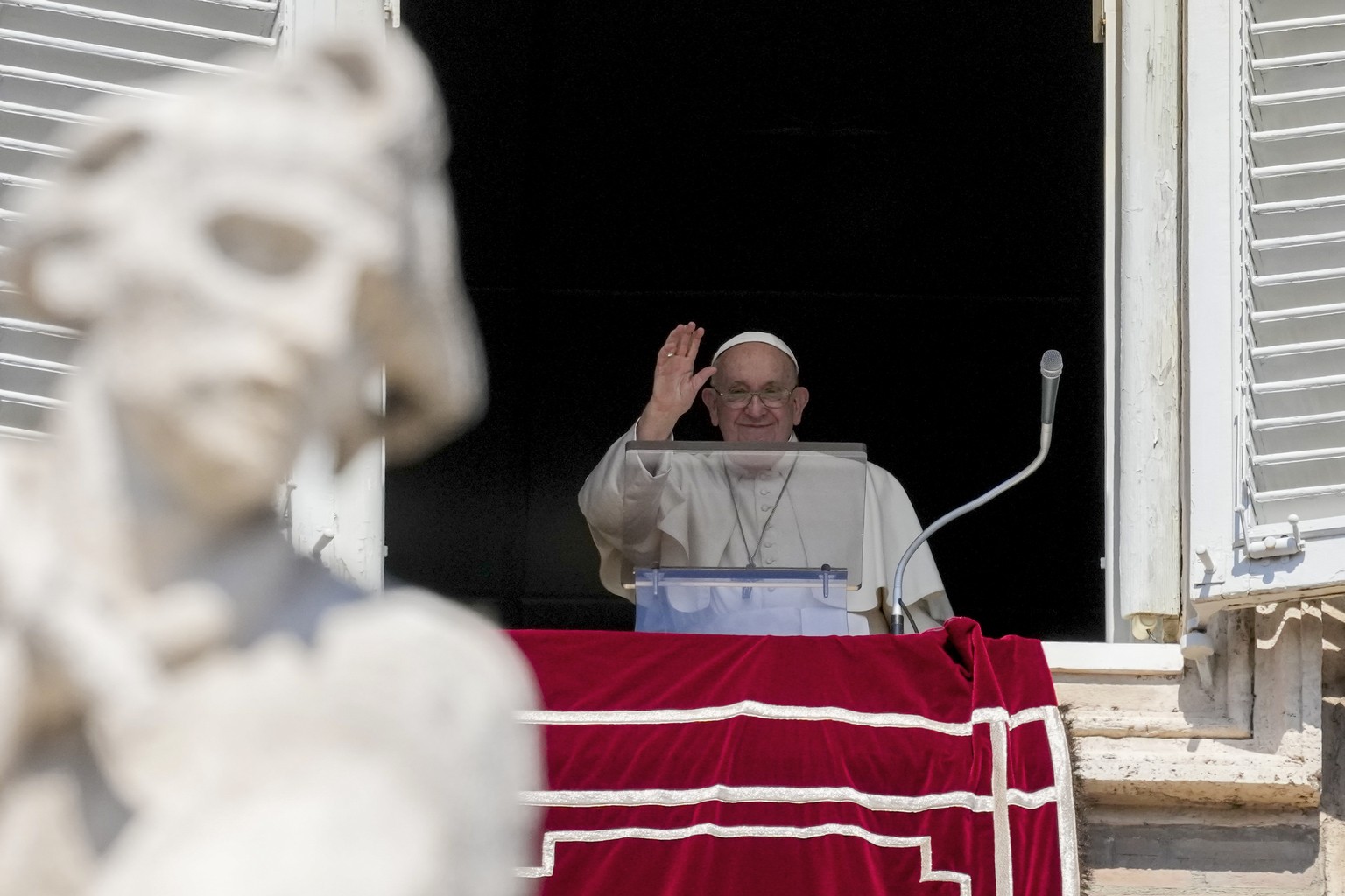 Pope Francis delivers his blessing as he recites the Angelus noon prayer from the window of his studio overlooking St.Peter&#039;s Square, at the Vatican, Sunday, Sept. 10, 2023. (AP Photo/Andrew Medi ...