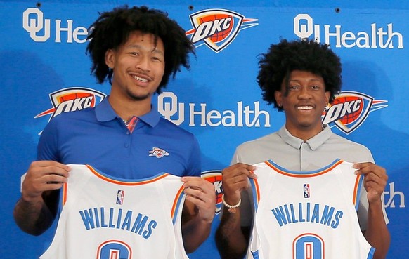 Syndication: The Oklahoman From left: Thunder draft picks Jaylin Williams, Jalen Williams, Ousmane Dieng, and Chet Holmgren pose for a photo beside OKC general manager Sam Presti during a press confer ...