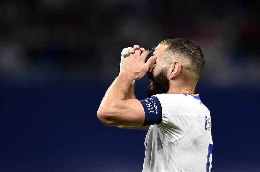 Real Madrid&#039;s Karim Benzema reacts during the Champions League group D soccer match between Real Madrid and Sheriff, Tiraspol at the Bernabeu stadium in Madrid, Spain, Tuesday, Sept. 28, 2021. (A ...