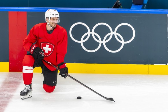epa12717526 Switzerland's Roman Josi smiles during a training session of team Switzerland at the 2026 Olympic Winter Games in Milan Santa Giulia Ice Hockey Arena, Italy, 08 February 2026. EPA/SAL ...