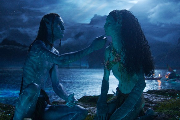 This image released by Disney shows Lo'ak, performed by Britain Dalton, left, and Tsireya, performed by Bailey Bass in a scene from "Avatar: Fire and Ash." (20th Century Studios/Disney  ...