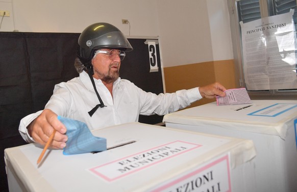 Five-Star Movement&#039;s leader Beppe Grillo casts his ballots for Italy&#039;s mayoral elections in Genoa, Italy, Sunday, June 11, 2017. Italy’s populist 5-Star Movement was seeking to expand power  ...