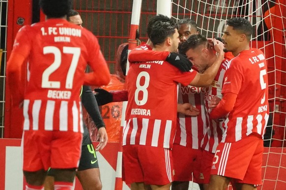 epa10441677 Union?s player celebrate after scoring the 1-1 goal in the German DFB Cup round of sixteen soccer match between FC Union Berlin and VfL Wolfsburg in Berlin, Germany, 31 January 2023. EPA/C ...