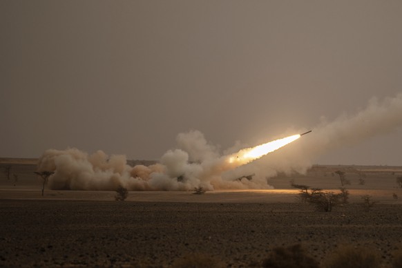 A launch truck fires the High Mobility Artillery Rocket System (HIMARS) at its intended target during the African Lion military exercise in Grier Labouihi complex, southern Morocco, Wednesday, June 9, ...