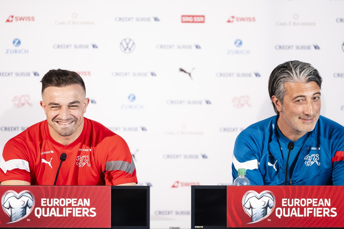 Switzerland's head coach Murat Yakin, right, and Switzerland's midfielder Xherdan Shaqiri attend a press conference of the national soccer team one day before the UEFA Euro 2024 qualifying g ...