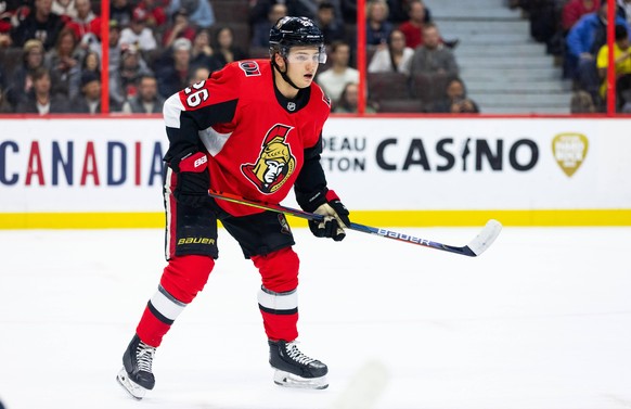 OTTAWA, ON - JANUARY 02: Ottawa Senators defenseman Erik Brannstrom 26 keeps eyes on the play during first period National Hockey League action between the Florida Panthers and Ottawa Senators on Janu ...