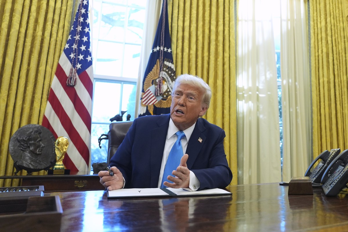 FILE - President Donald Trump speaks to reporters as he signs executive orders in the White House on Tuesday, Feb. 4, 2025, in Washington. (AP Photo/Evan Vucci, File).
Donald Trump