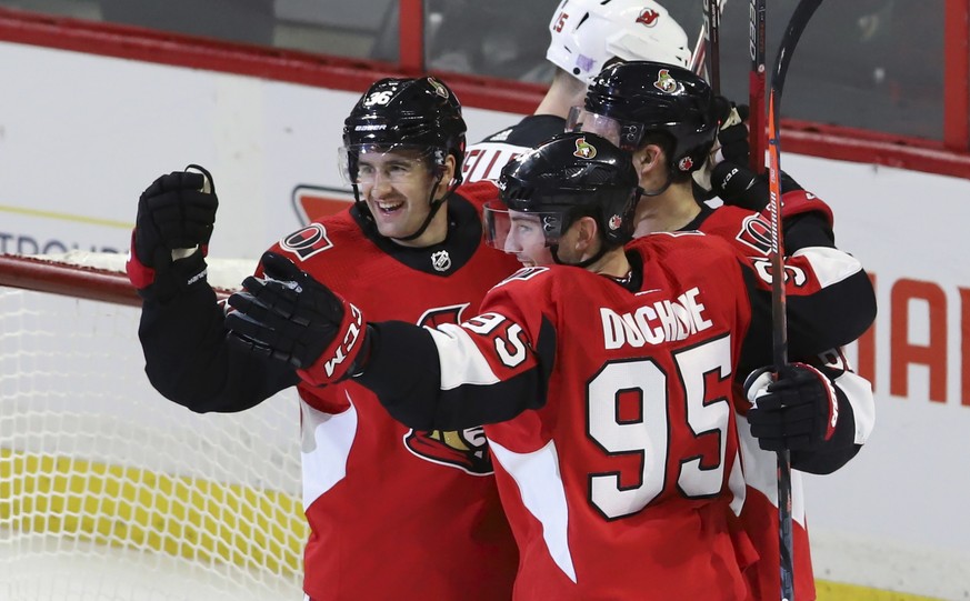Ottawa Senators&#039; Colin White (36) celebrates his goal against the New Jersey Devils with Matt Duchene (95) and Mark Stone (61) during the second period of an NHL hockey game, Tuesday, Nov. 6, 201 ...