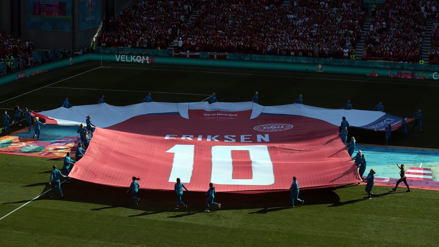 epa09280070 A special choreography for Denmark&#039;s player Christian Eriksen is seen prior to the UEFA EURO 2020 group B preliminary round soccer match between Denmark and Belgium in Copenhagen, Den ...