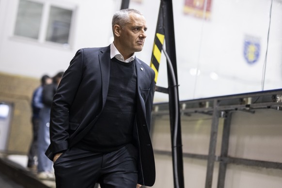 Newly promoted Swiss Head Coach Jan Cadieux walks back to the bench during his first match as Head Coach of the national team, a friedly ice hockey match between Slovakia and Switzerland in Topolcany, ...