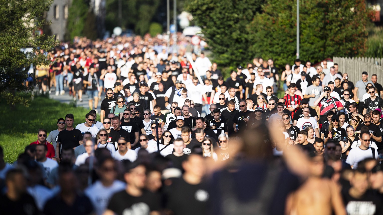 epa07762504 Fans of Eintracht Frankfurt arrive for the UEFA Europa League third qualifying round, first leg soccer match between FC Vaduz and Eintracht Frankfurt in Vaduz, Liechtenstein, 08 August 201 ...