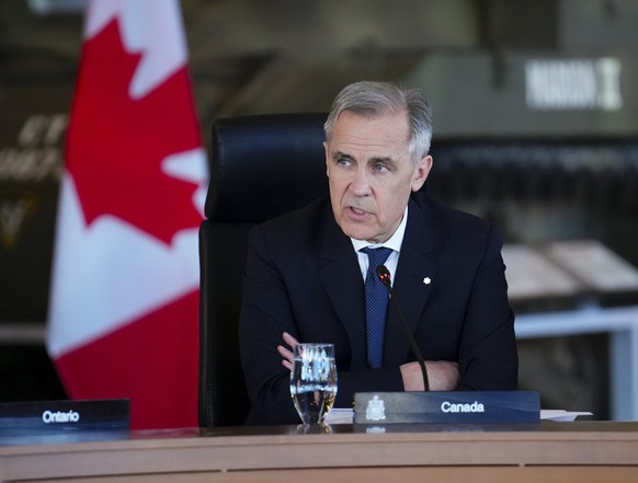 Prime Minister Mark Carney takes part in the First Minister Meeting at the National War Museum inn Ottawa on Friday, March 21, 2025. (Sean Kilpatrick/The Canadian Press via AP)
Canada Carney
