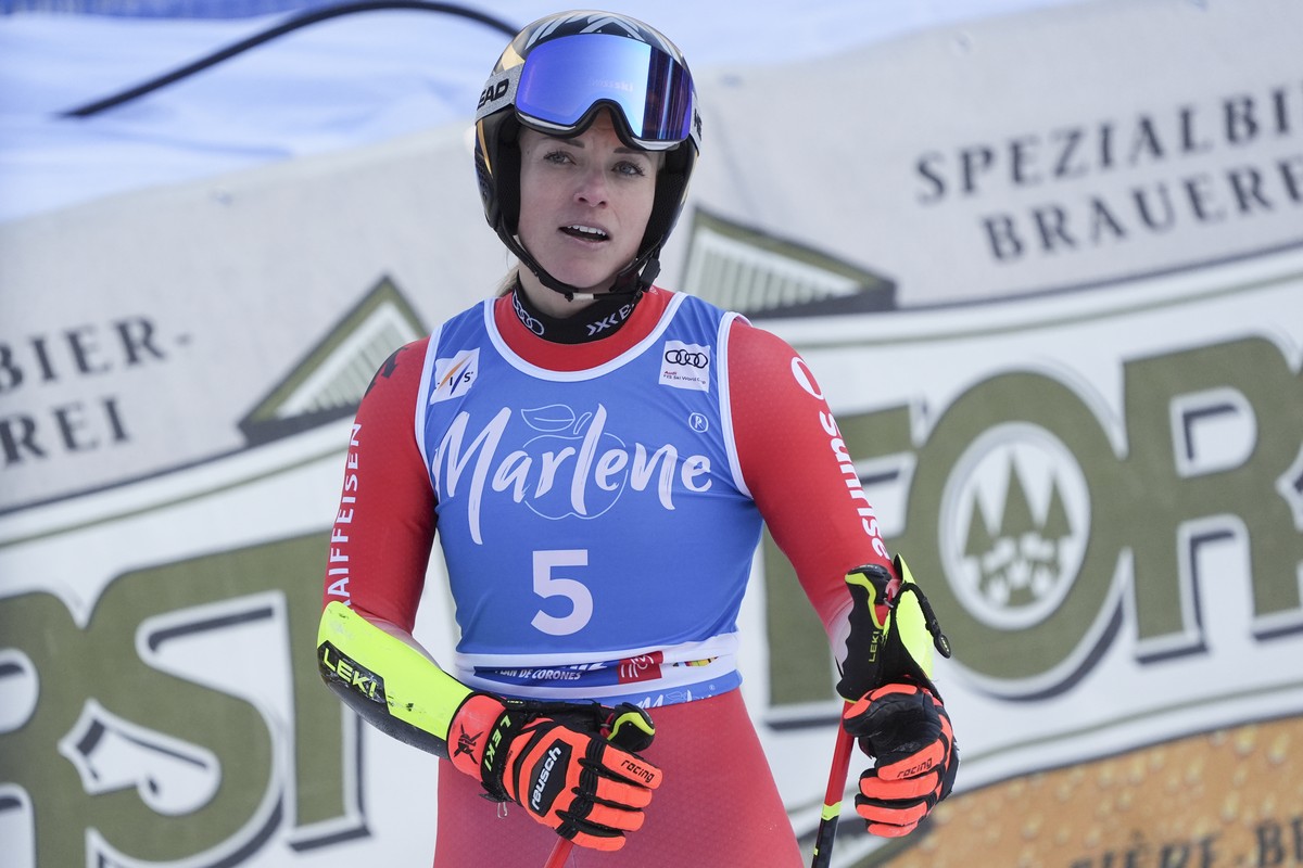 Switzerland's Lara Gut Behrami checks her time at the finish area of an alpine ski, women's World Cup Giant Slalom, in Plan de Corones, Italy, Tuesday, Jan. 21, 2025. (AP Photo/Giovanni Aule ...