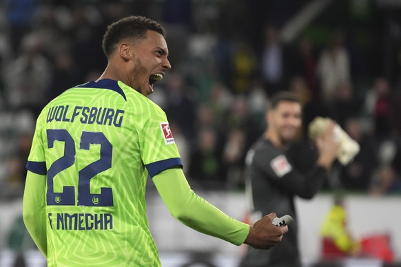 Wolfsburg&#039;s Felix Nmecha who scored the second goal, celebrates a win against Borussia after the end of the German Bundesliga soccer match between VfL Wolfsburg and Borussia Dortmund in Wolfsburg ...