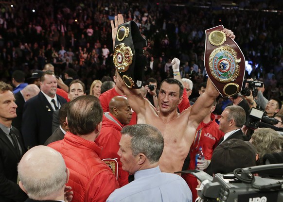 Wladimir Klitschko, of Ukraine, poses for fans after a heavyweight boxing match against Bryant Jennings, early Sunday, April 26, 2015, at Madison Square Garden in New York. Klitschko won the fight by  ...