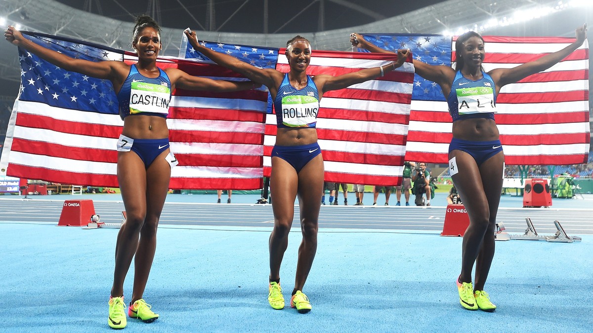 epa05495318 Brianna Rollins (C) of the USA celebrates after winning the women's 100m Hurdles final of the Rio 2016 Olympic Games Athletics, Track and Field events at the Olympic Stadium in Rio de ...