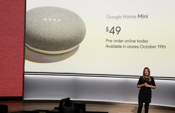 epa06244904 Google Senior Industrial Designer Isabelle Olsson, introduces the Google Home Mini which is priced at $49, during the new product launch at the San Francisco Jazz Center in San Francisco,  ...