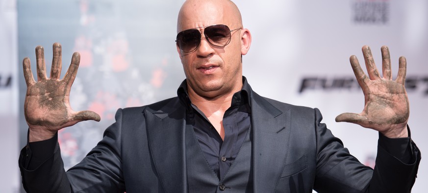 Vin Diesel poses for a photo during the Vin Diesel Hand and Footprint ceremony in the courtyard of the TCL Chinese Theatre on Wednesday, April 1, 2015, in Los Angeles. The actor stars in the new film, ...