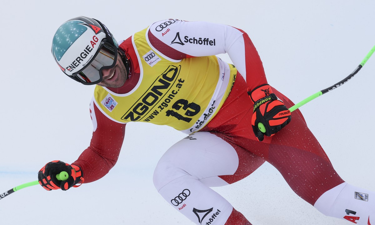 Austria's Vincent Kriechmayr celebrates at the finish area of an alpine ski, men's World Cup downhill, in Val Gardena, Italy, Thursday, Dec.15, 2022. (AP Photo/Alessandro Trovati)