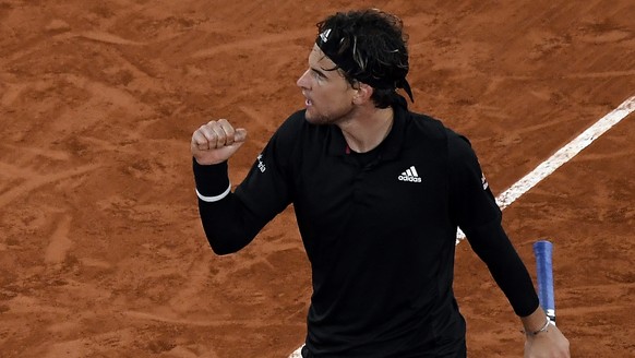 epa08720679 Dominic Thiem of Austria reacts as he plays Hugo Gaston of France during their men?s fourth round match during the French Open tennis tournament at Roland ?Garros in Paris, France, 04 Octo ...