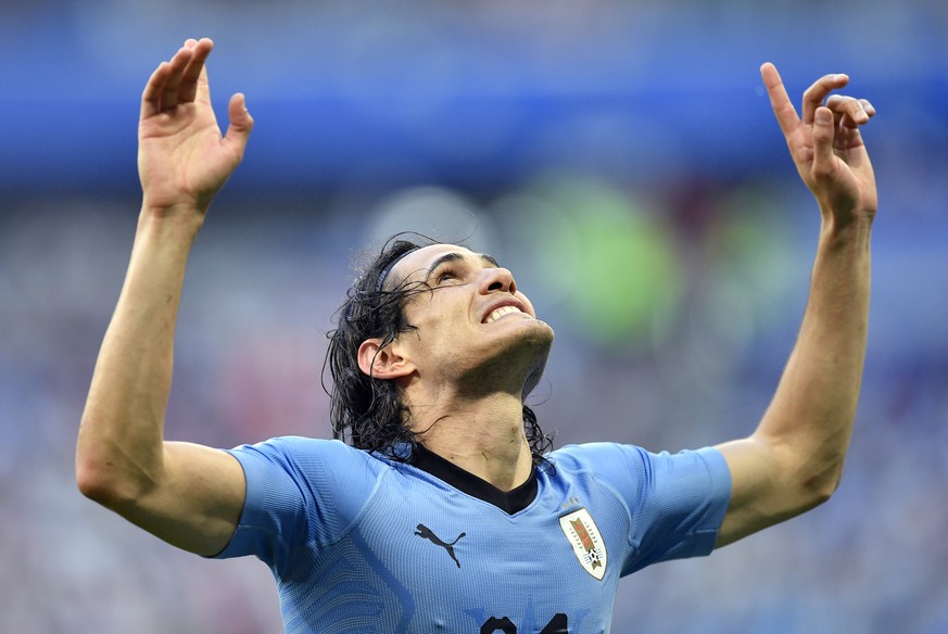 Uruguay&#039;s Edinson Cavani celebrates after scoring his team&#039;s third goal during the group A match between Uruguay and Russia at the 2018 soccer World Cup at the Samara Arena in Samara, Russia ...