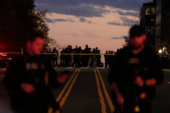 FILE - Emergency personnel keep a presence following the shooting of two National Guard soldiers near the White House in Washington, Nov. 26, 2025. (AP Photo/Mark Schiefelbein, File)
Pictures of the W ...