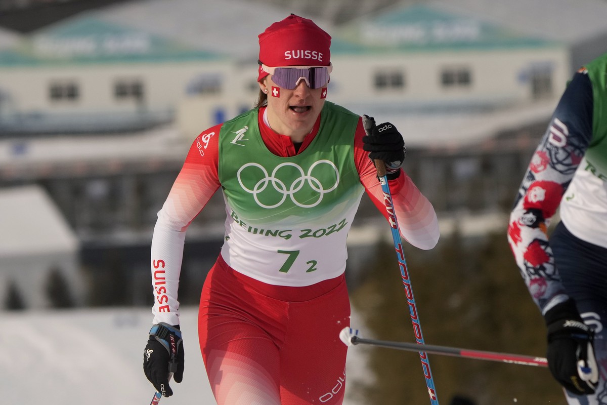 Nadine Faehndrich, of Switzerland, competes during the women's 4 x 5km relay cross-country skiing competition at the 2022 Winter Olympics, Saturday, Feb. 12, 2022, in Zhangjiakou, China. (AP Phot ...