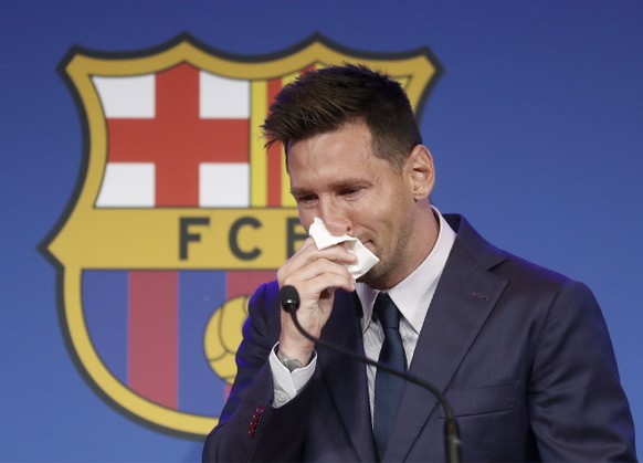 epa09405843 Argentine forward Lionel Messi gets emotional during a press conference to explain his version of the reasons for his departure from Barcelona FC in Barcelona, Spain, 08 August 2021. FC Ba ...