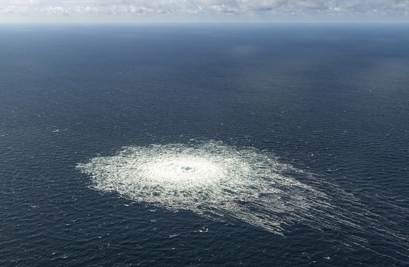 A large disturbance in the sea can be observed off the coast of the Danish island of Bornholm Tuesday, Sept. 27, 2022 following a series of unusual leaks on two natural gas pipelines running from Russ ...