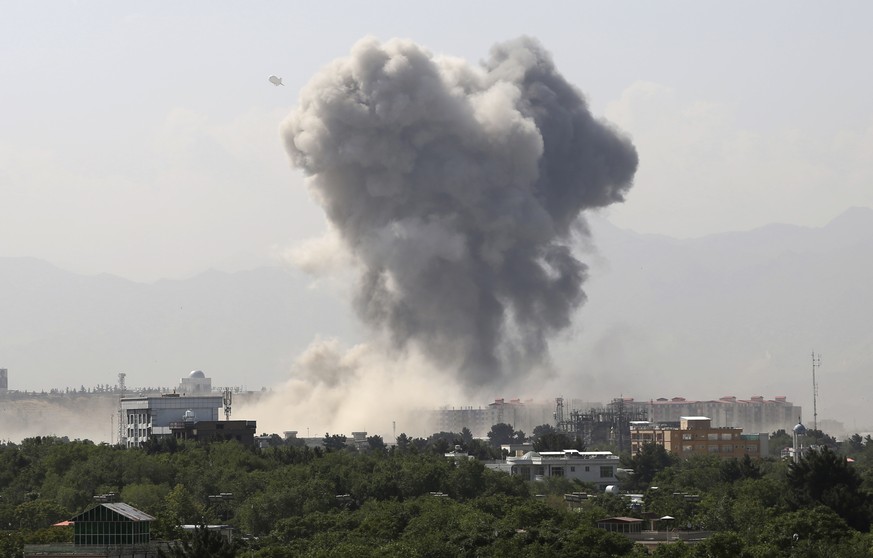 Smokes rises after an explosion in Kabul, Afghanistan, Monday, July 1, 2019. A powerful bomb blast rocked the Afghan capital early Monday, rattling windows, sending smoke billowing from Kabul&#039;s d ...