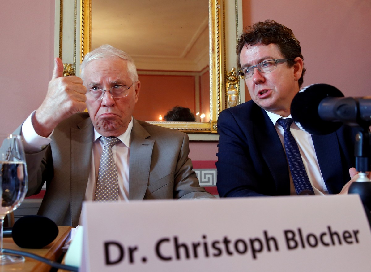 Christoph Blocher president of the "No to slow EU accession" committee (L), gestures next to Albert Roesti, president of the Swiss People's Party (SVP), during a news conference in Bern ...