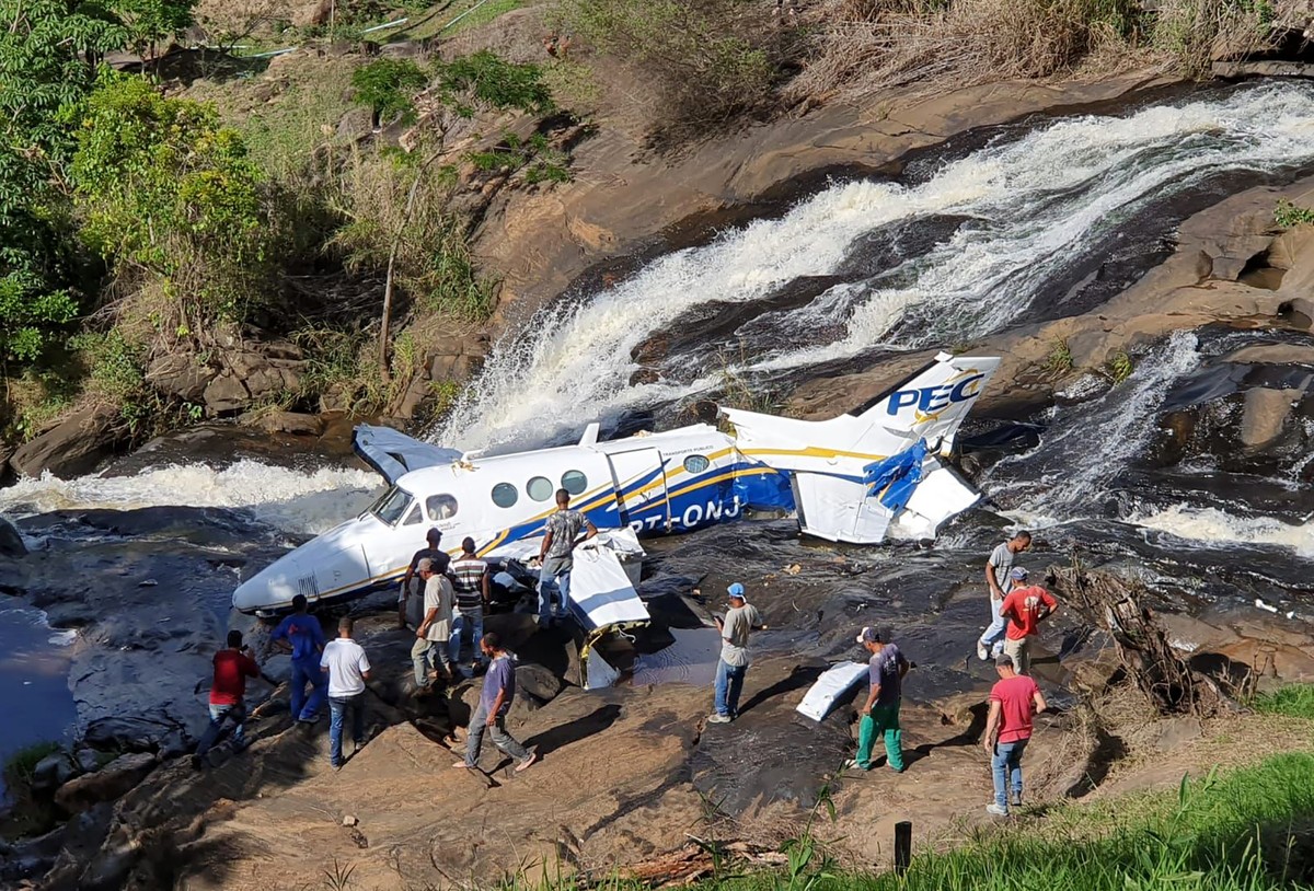 This handout photo released by Minas Gerais Military Firefighters Corps shows the airplane plane that crashed that was transporting Brazilian singer Marilia Mendonca, in the southeastern Brazilian of  ...