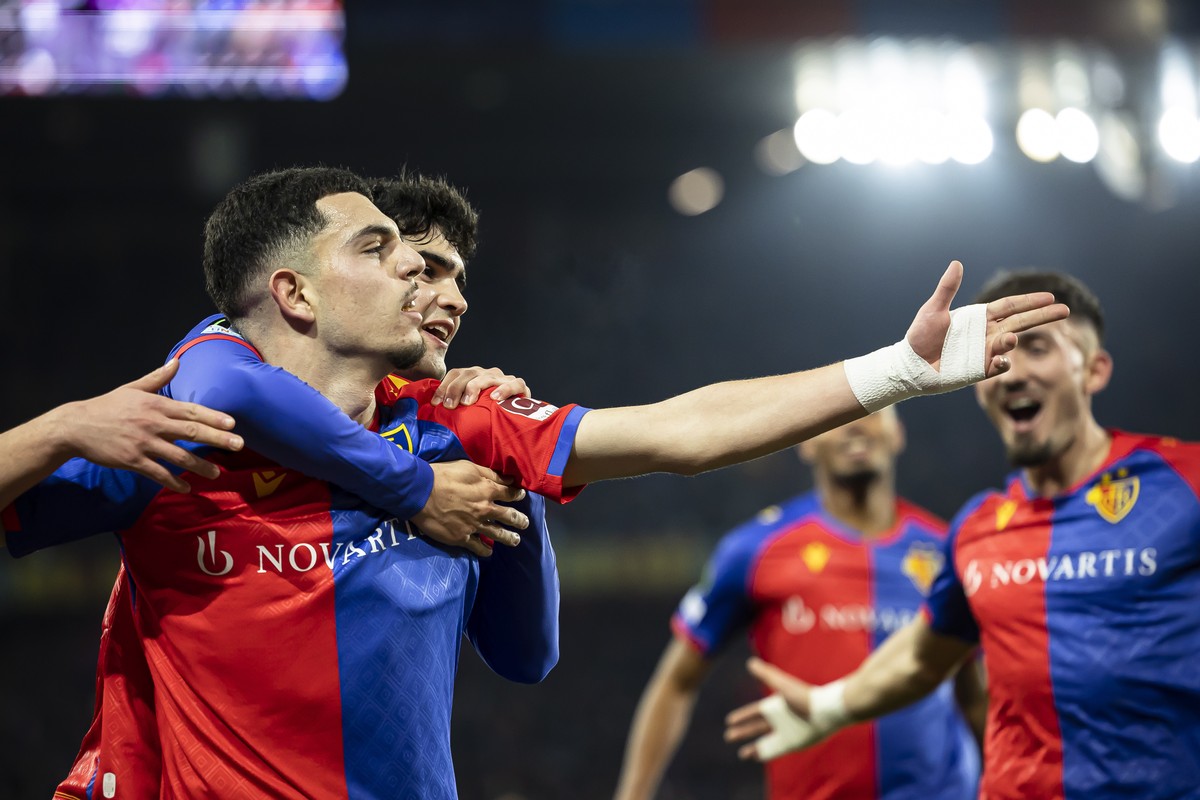 epa10486807 Basel's Zeki Amdouni (L) reacts after scoring the first goal for his team during the UEFA Europa Conference League play-off second leg soccer match between Switzerland's FC Basel ...