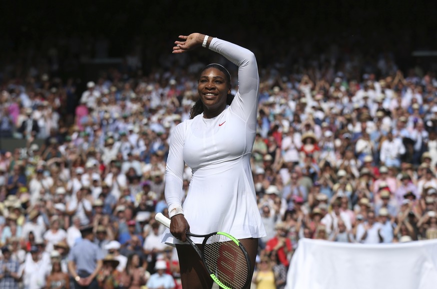 Serena Williams of the US celebrates defeating Julia Goerges of Germany in their women&#039;s semifinal match at the Wimbledon Tennis Championships in London, Thursday July 12, 2018. (Jonathan Brady/P ...