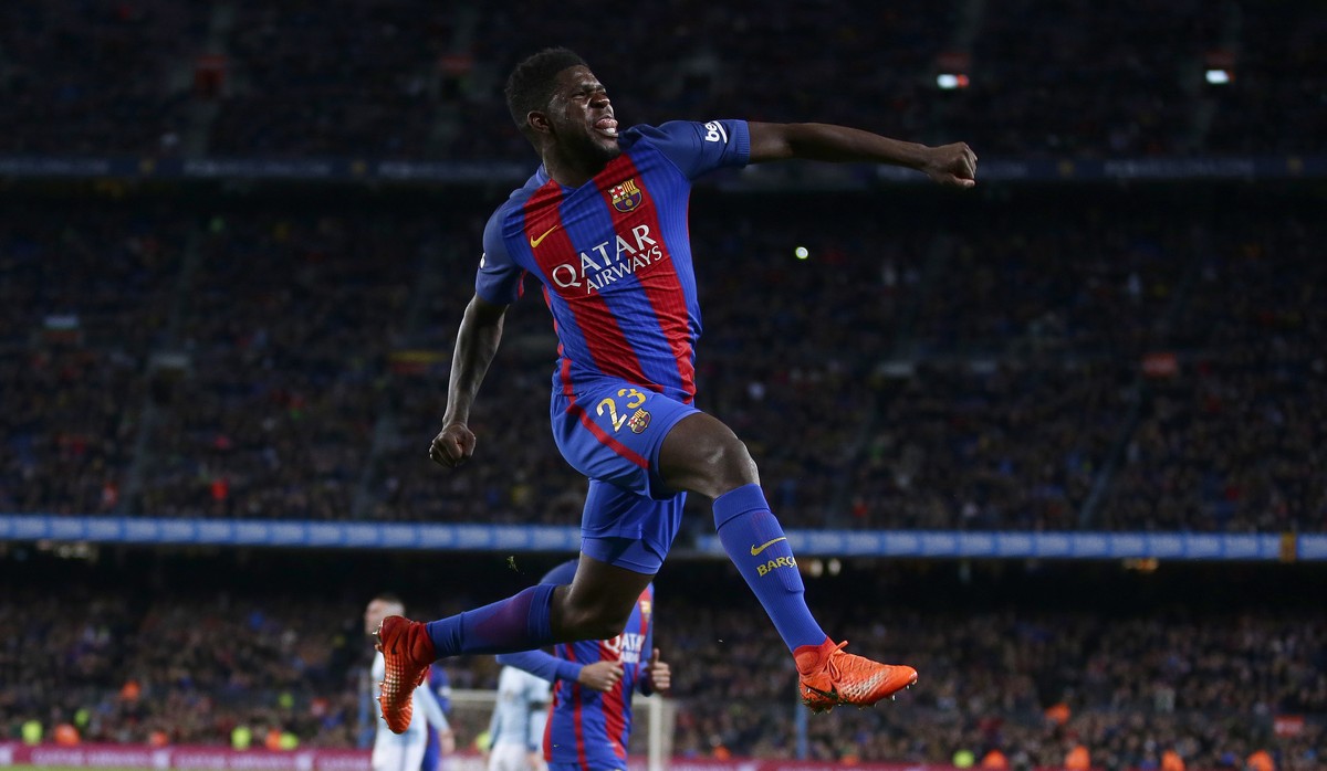 FC Barcelona's Samuel Umtiti celebrates after scoring during the Spanish La Liga soccer match between FC Barcelona and Celta Vigo at the Camp Nou in Barcelona, Spain, Saturday, March 4, 2017. (AP ...