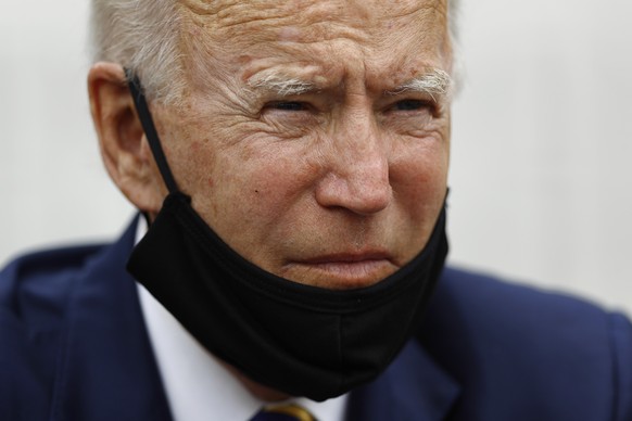 Democratic presidential candidate, former Vice President Joe Biden listens as he meets with small business owners, Wednesday, June 17, 2020, at Carlette&#039;s Hideaway, a soul food restaurant, in Yea ...