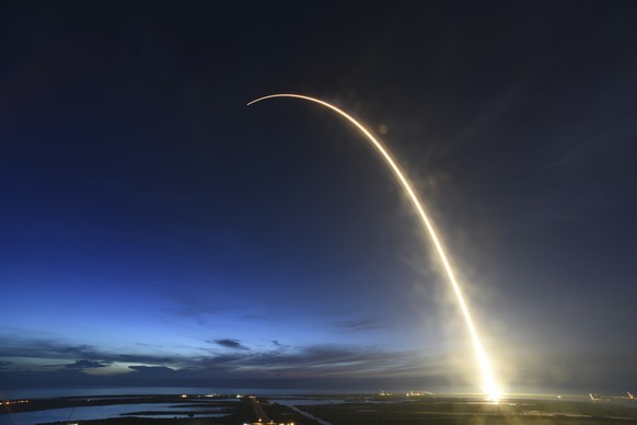 A SpaceX Falcon 9 rocket launches just before dawn Friday, June 29, 2018 at Launch Complex 40 at Cape Canaveral, Fla. The used Falcon rocket blasted off before dawn, hauling nearly 6,000 pounds (2,700 ...
