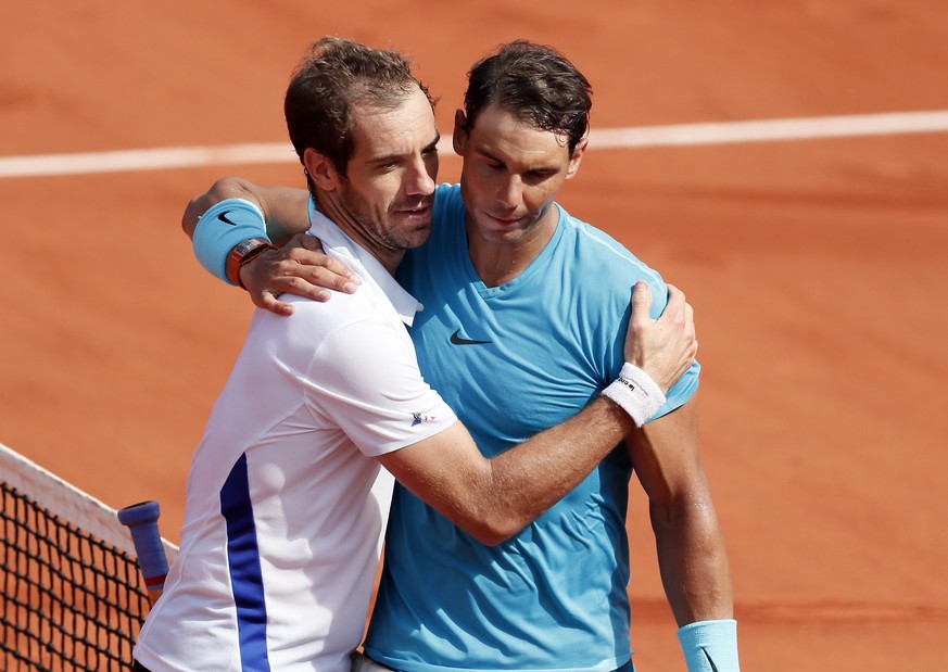 epa06780375 Rafael Nadal of Spain reacts with Richard Gasquet of France after winning their their men’s third round match during the French Open tennis tournament at Roland Garros in Paris, France, 02 ...