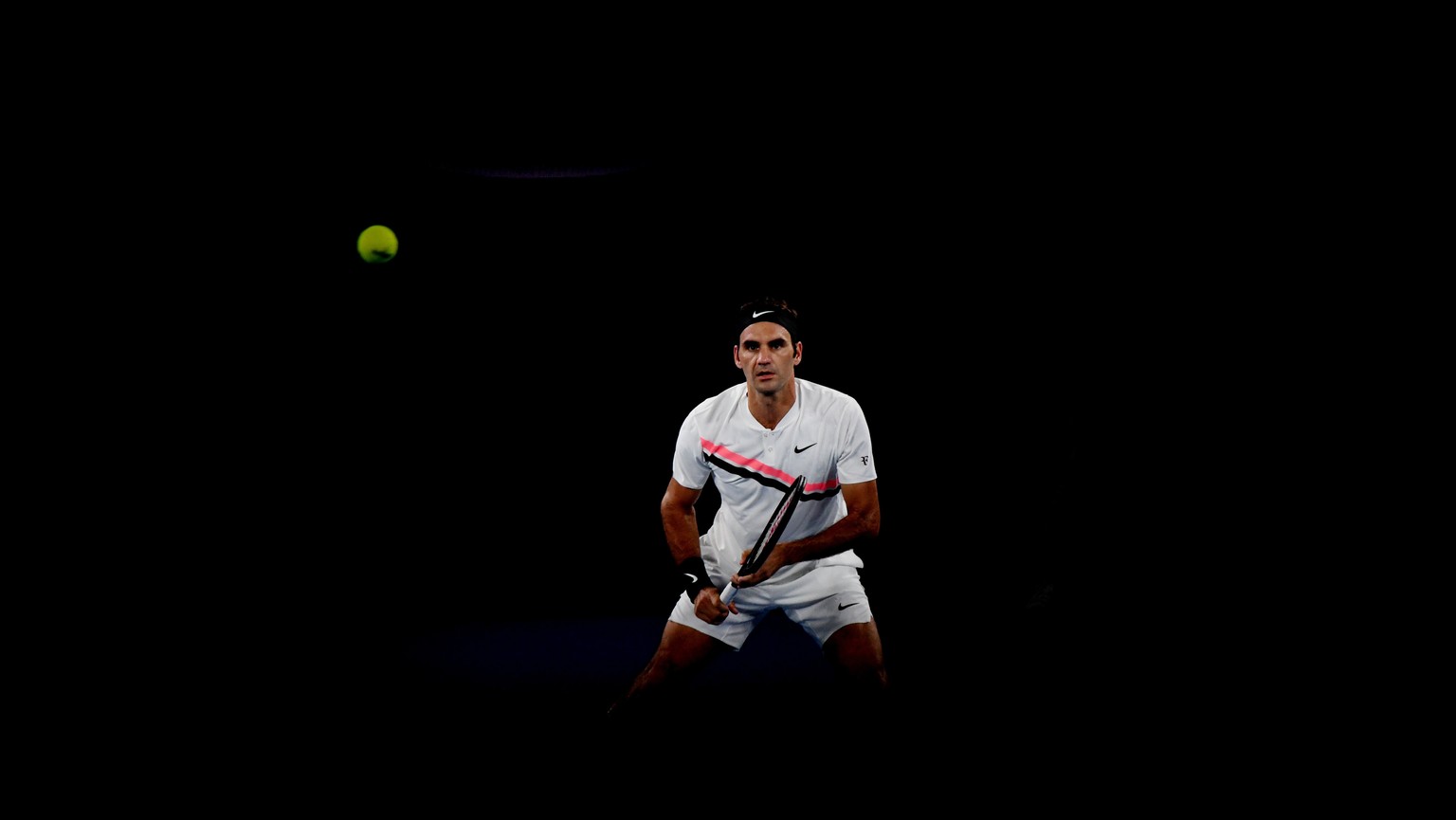 epa06475080 Roger Federer of Switzerland in action against Hyeon Chung of South Korea during the mens semifinal on day twelve of the Australian Open tennis tournament, in Melbourne, Australia, Friday, ...