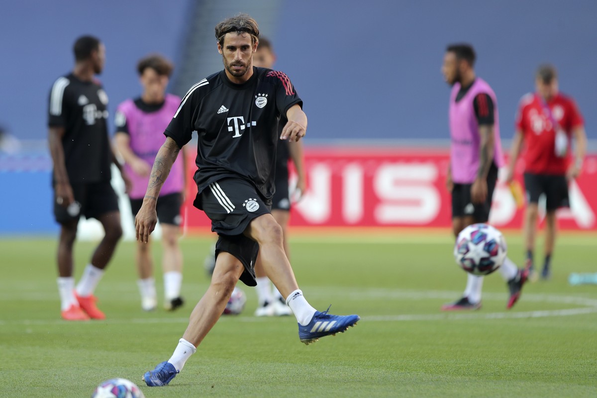 Bayern's Javi Martinez kicks a ball during a training session at the Luz stadium in Lisbon, Saturday Aug. 22, 2020. Bayern Munich will play PSG in the Champions League final soccer match on Sunda ...