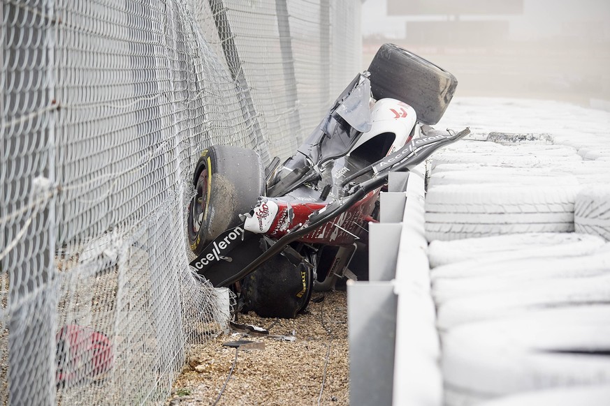 F1 Grand Prix of Great Britain Zhou Guanyu of China and Alfa Romeo F1 is assisted by the assistances during the race of the F1 Grand Prix of Great Britain at Silverstone on July 3, 2022 in Northampton ...