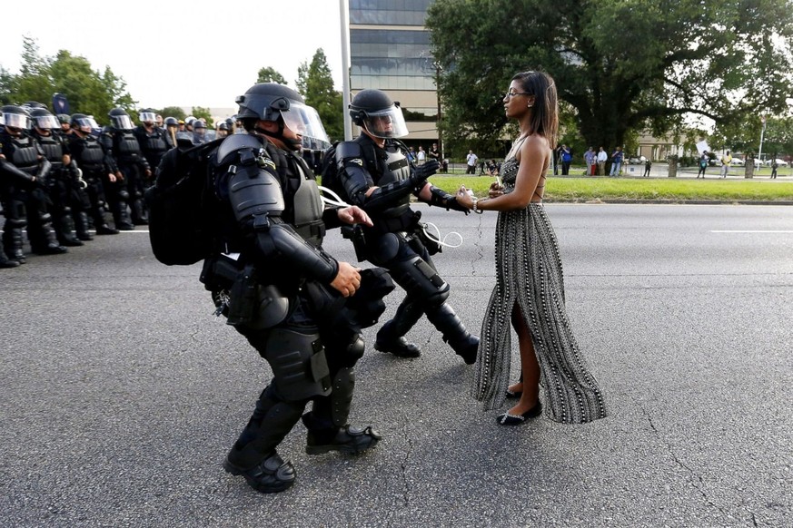 &quot;Taking a Stand in Baton Rouge&quot; is a photograph of Ieshia Evans, a nurse from Pennsylvania, being arrested by police officers dressed in riot gear during a protest in Baton Rouge, Louisiana, ...