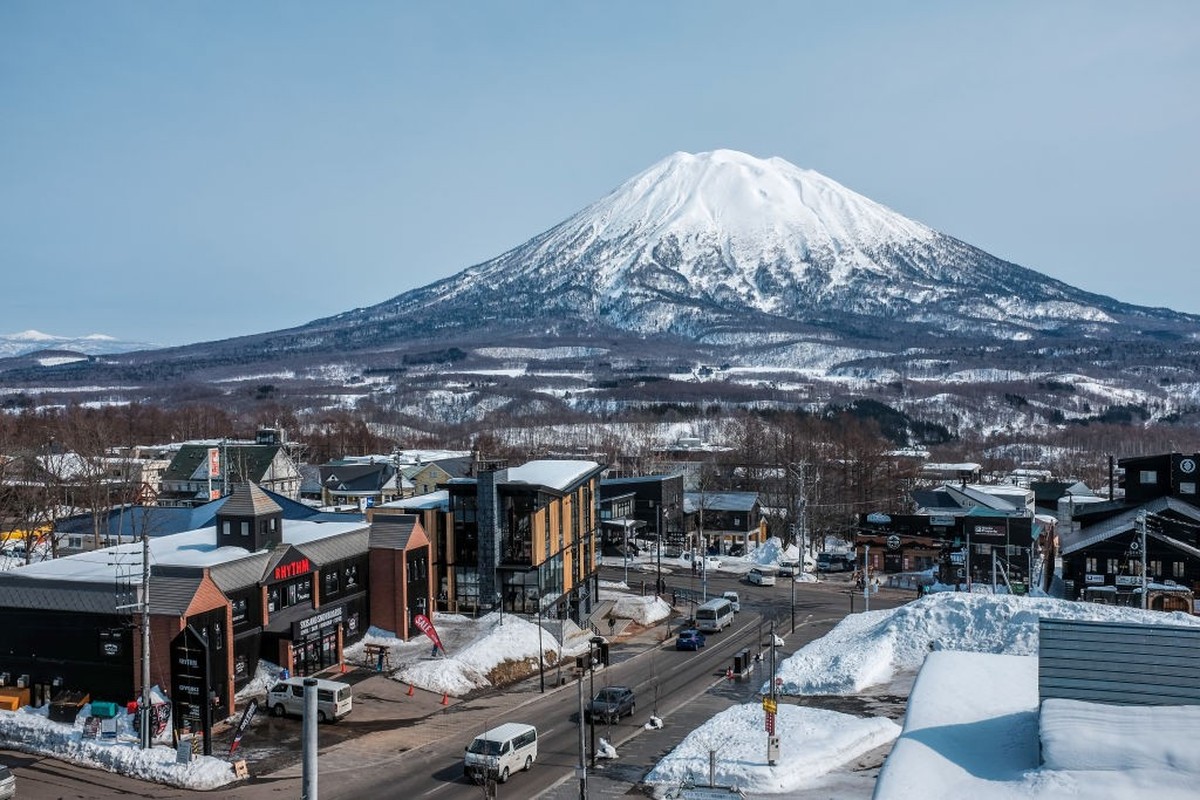 GRAND HIRAFU VILLAGE, NISEKO, HOKKAIDO, JAPAN - 2017/03/15: The snow-capped Mount Yotei, a dormant volcano in Niseko, Japan, as viewed in the evening light from the village of Grand Hirafu. (Photo by  ...